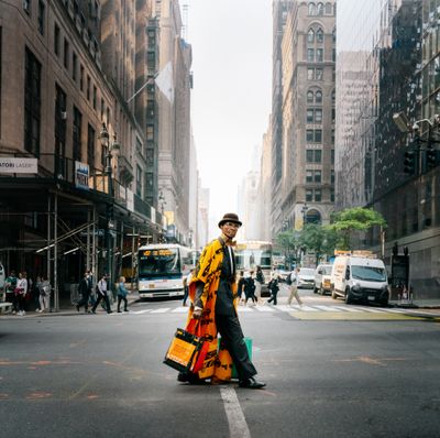 Caught this man on my way to work in midtown. Crossing Madison ave