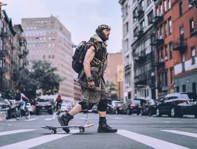 A man and his skateboard in Nolita