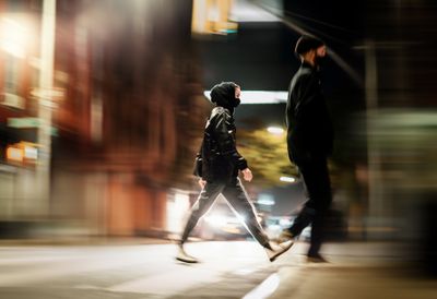 Couple passing Prince street in Nolita